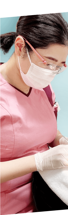 治療する歯科医